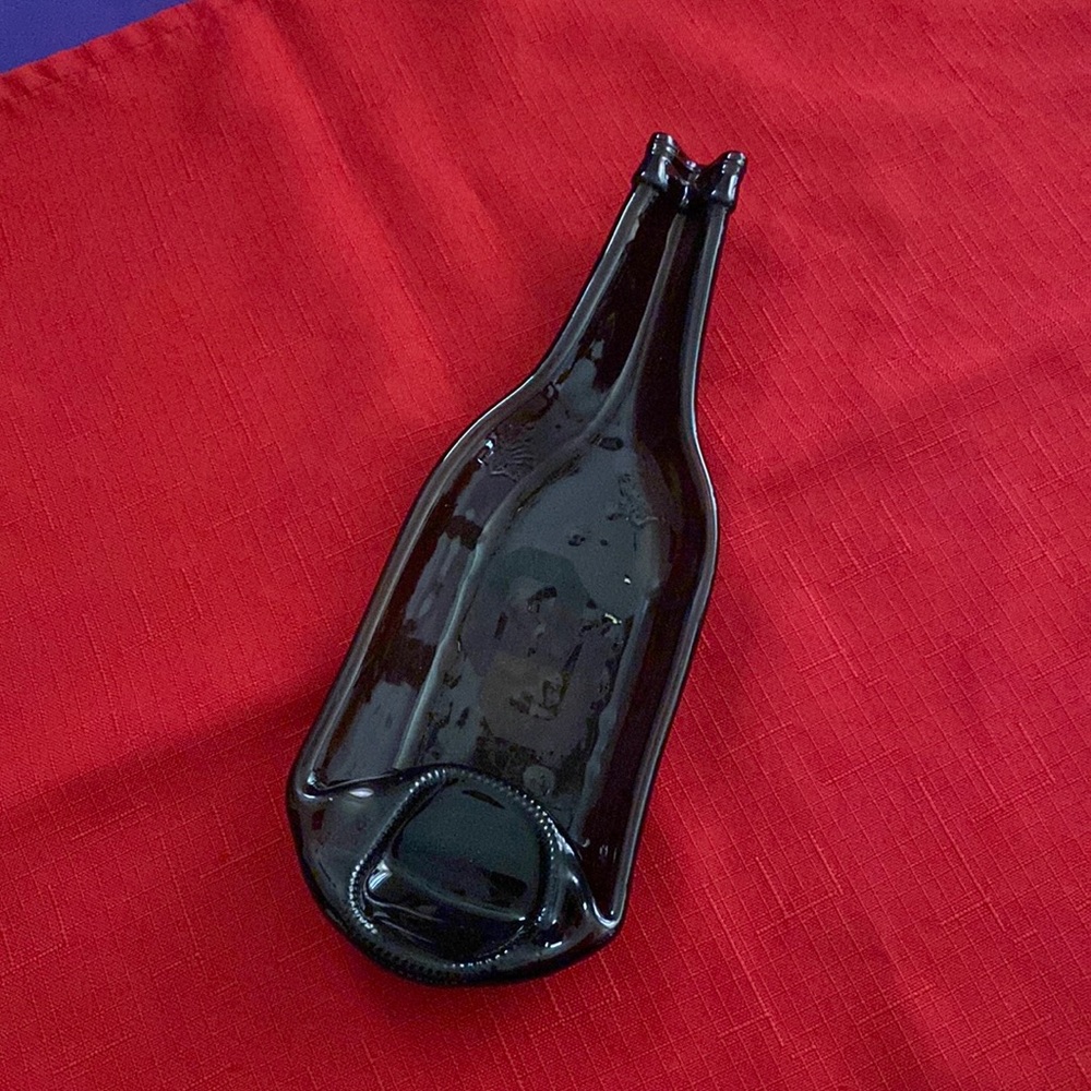 Football OÙ Sooner/boomer beer bottle shaped spoon holder. Great condition.